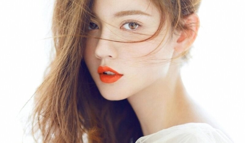 woman with orange lipstick