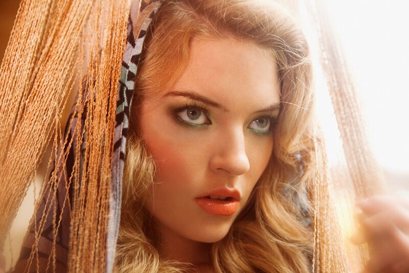 woman with orange makeup