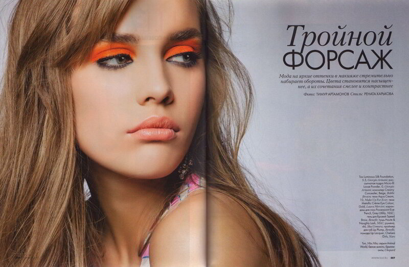 Woman with Orange Makeup — Dramatic