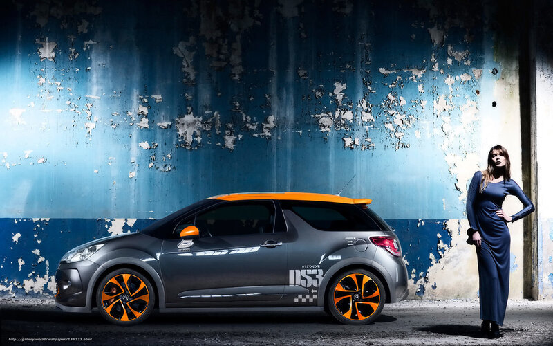woman with orange-roofed car