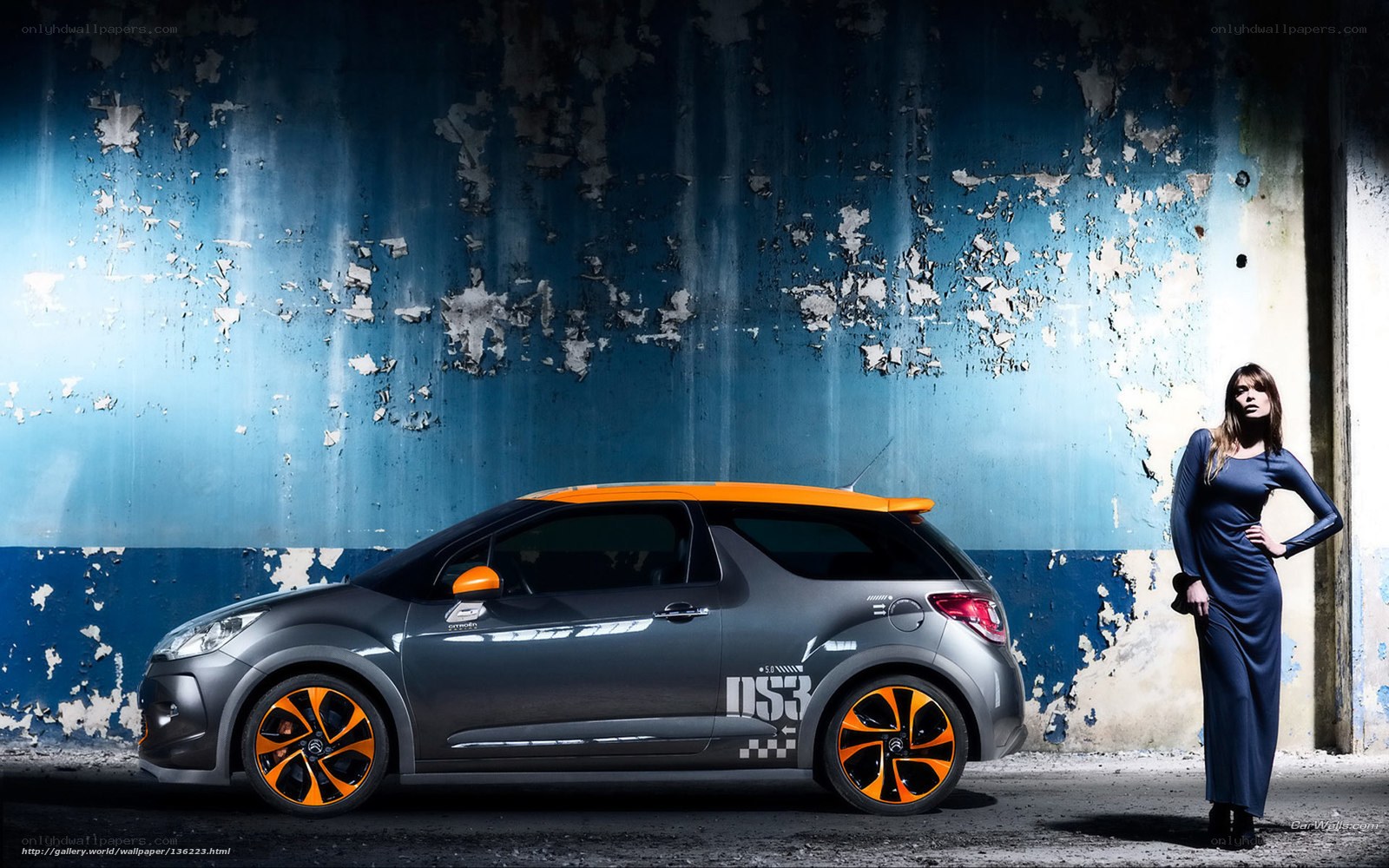 woman with orange-roofed car