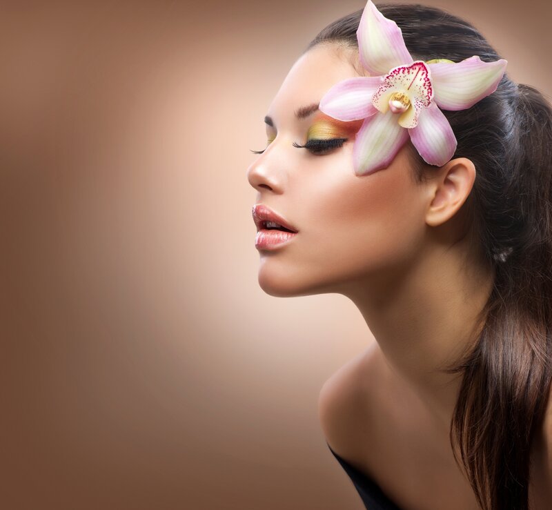 Woman with Orchid Flower — Brown