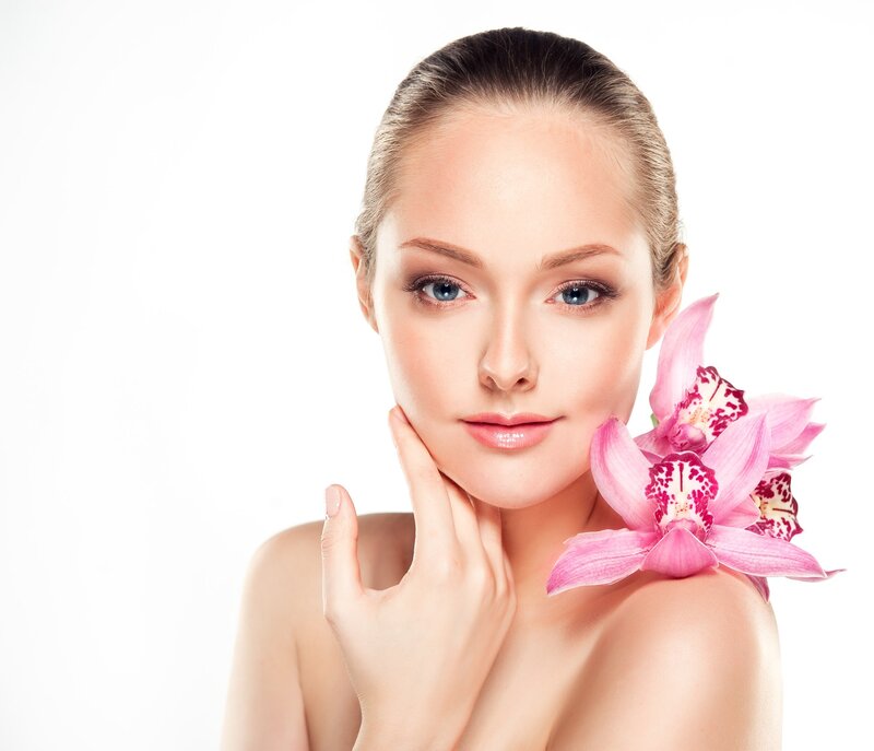 Woman with Orchid Flower — Pink, Serene, Photograph
