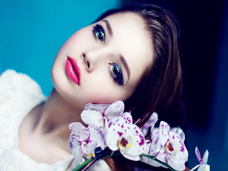 Woman with Orchid Flowers — White, Dramatic