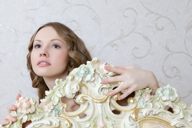 woman with ornate chair