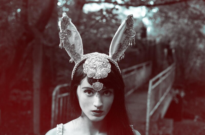 woman with ornate headpiece