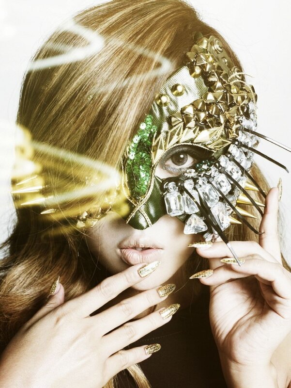 woman with ornate mask
