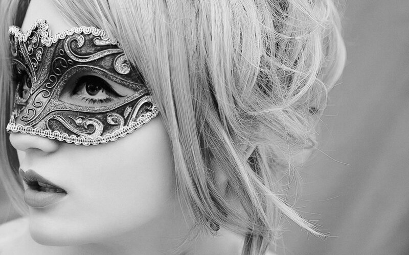 woman with ornate mask