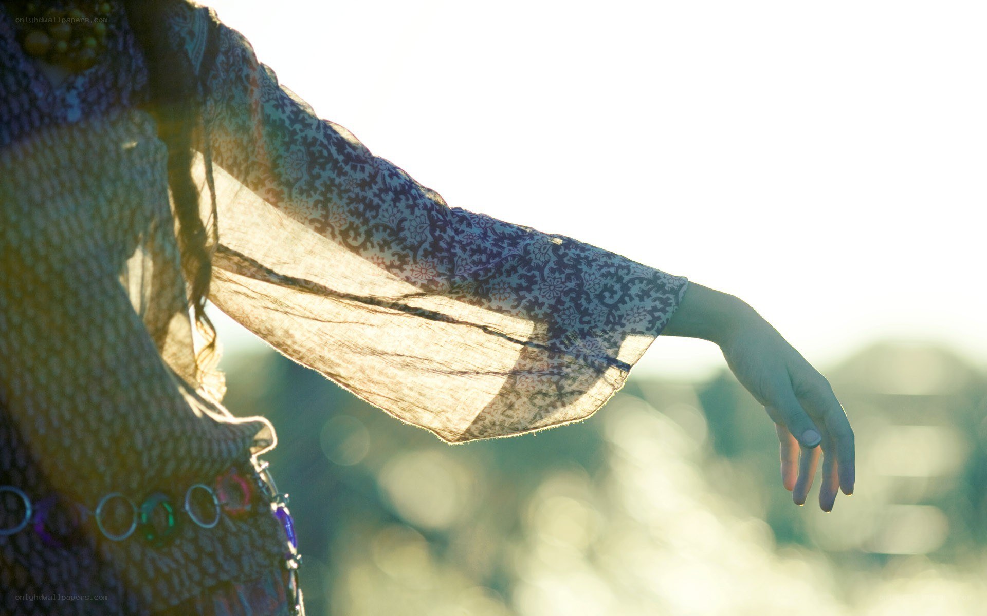 woman with outstretched arm