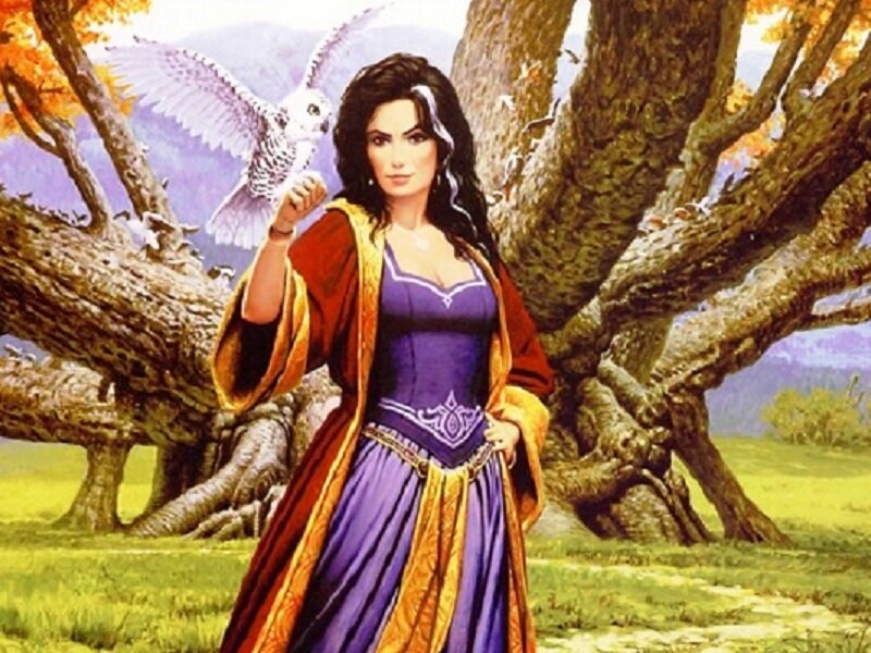 woman with owl in forest