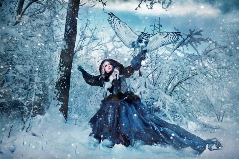 Woman with Owl in Snow