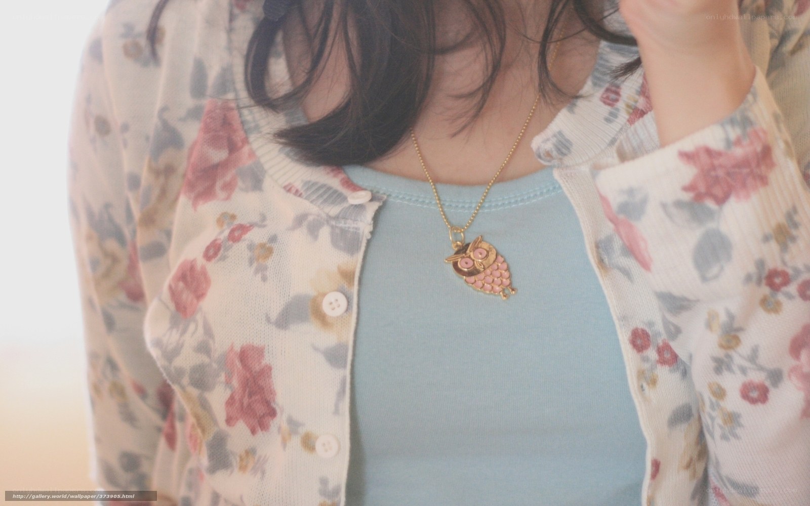 woman with owl necklace
