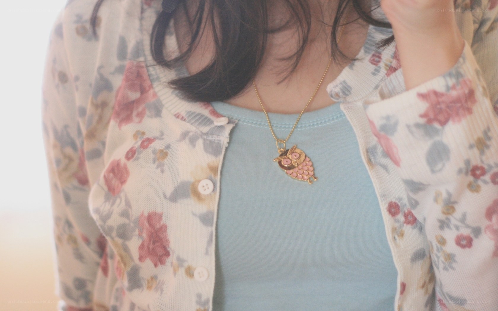 woman with owl necklace