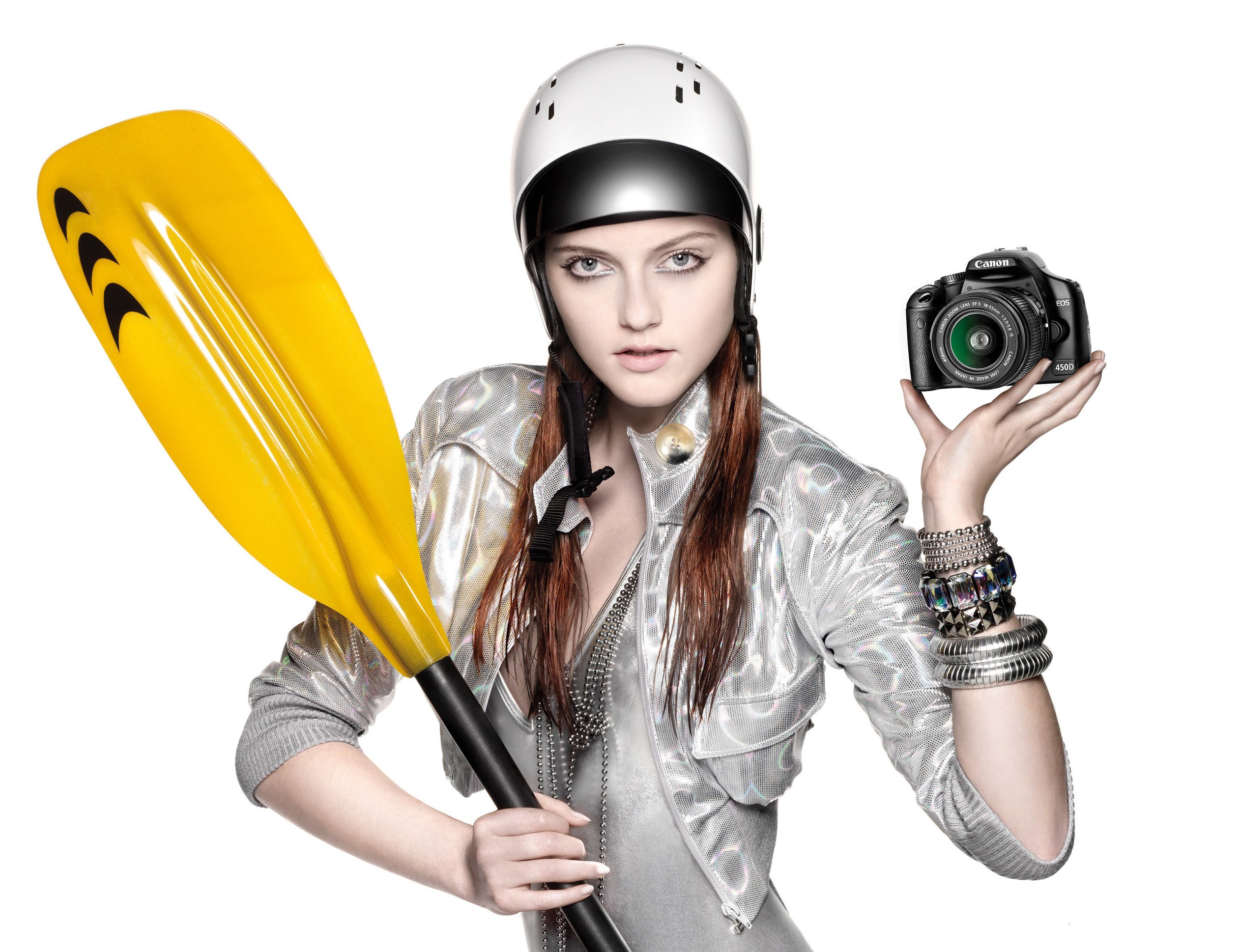 woman with paddle and camera