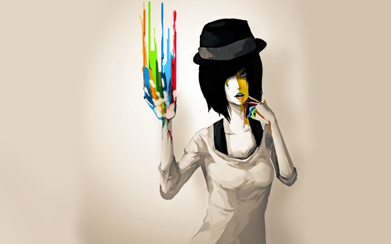 woman with paint-covered hand