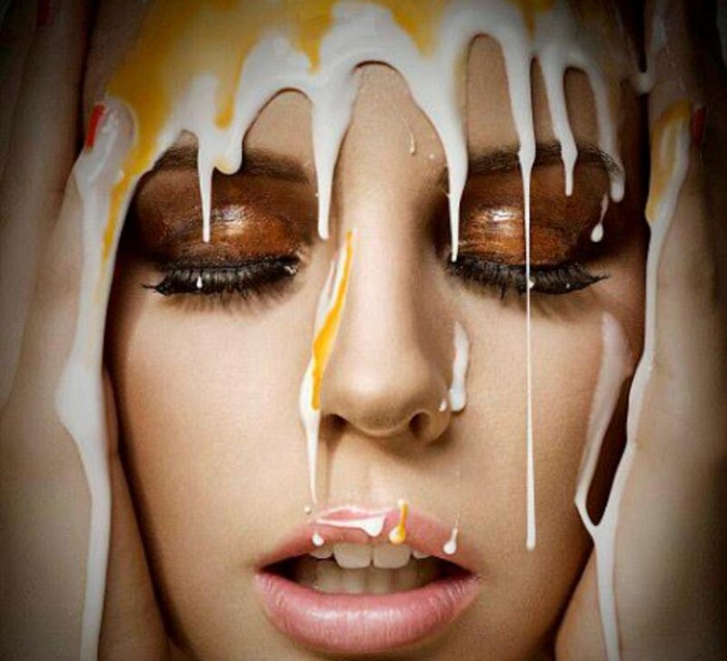 Woman with Paint on Face — White, Dramatic