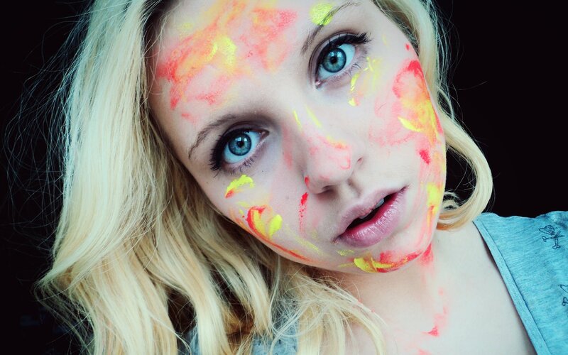 Woman with Paint on Face — Yellow
