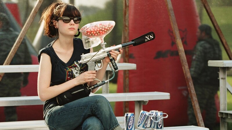 Woman with paintball gun