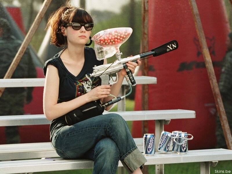 Woman with paintball gun