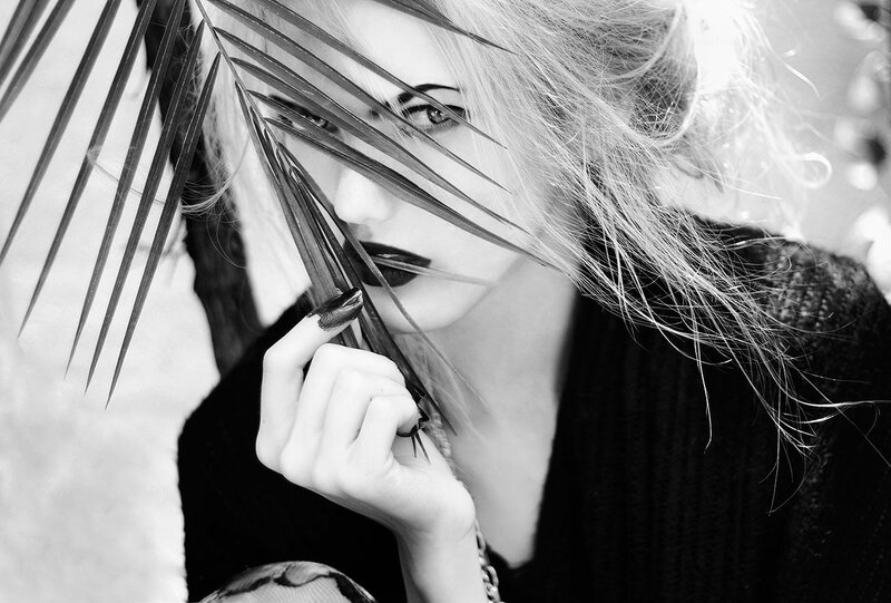 Woman with Palm Leaf — Black