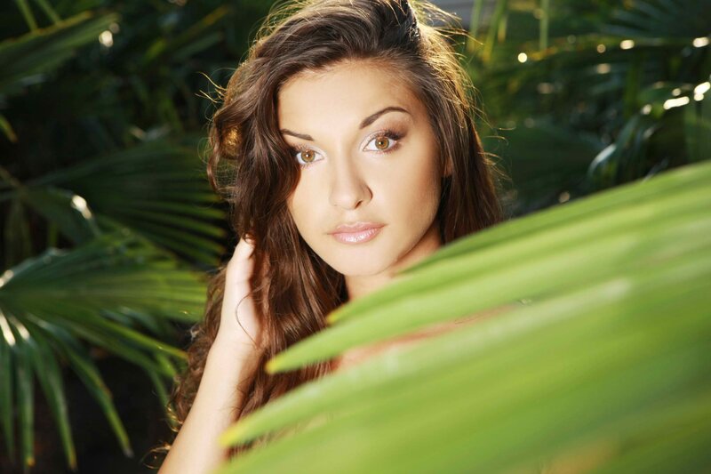 woman with palm leaves