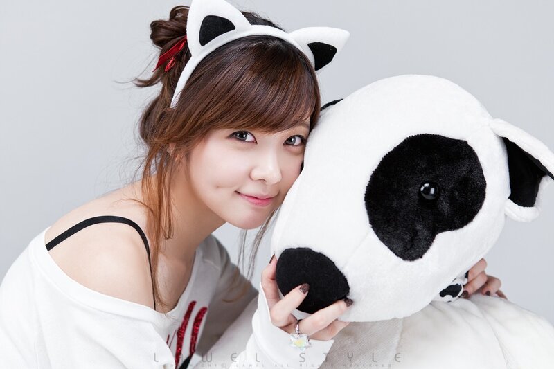 woman with panda plush toy