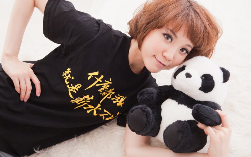 woman with panda plush toy