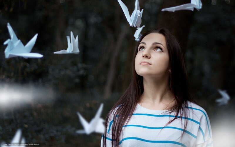 Woman with paper cranes