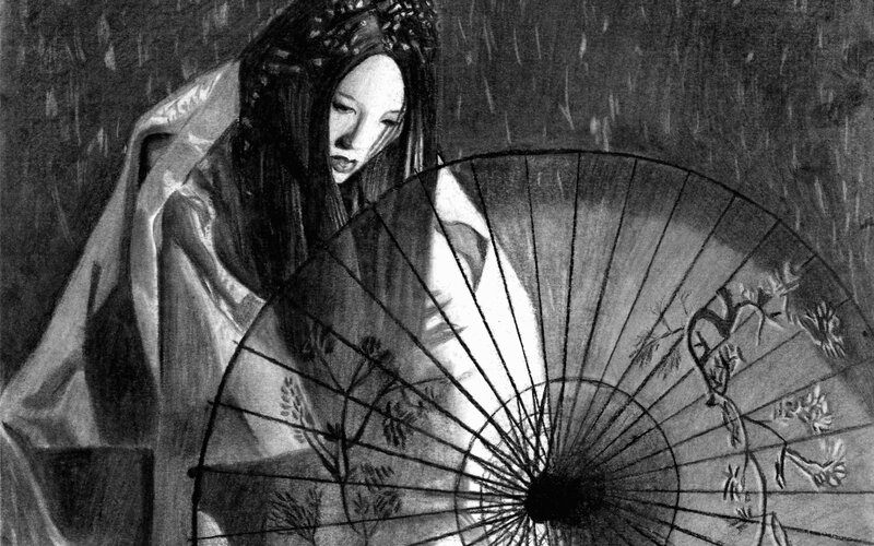 woman with paper umbrella in rain