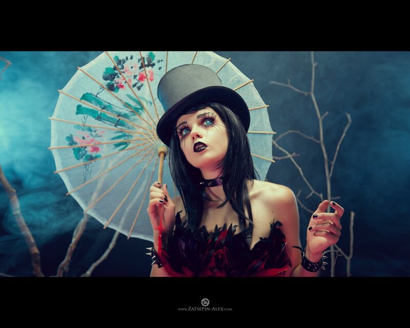 woman with parasol and top hat
