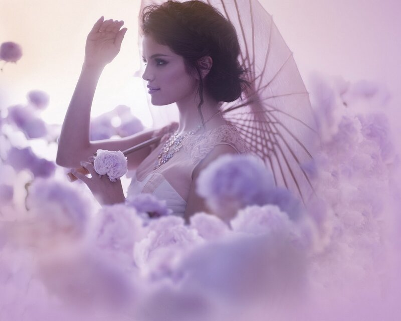 woman with parasol in flowers