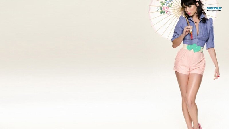 woman with parasol in pastel clothes