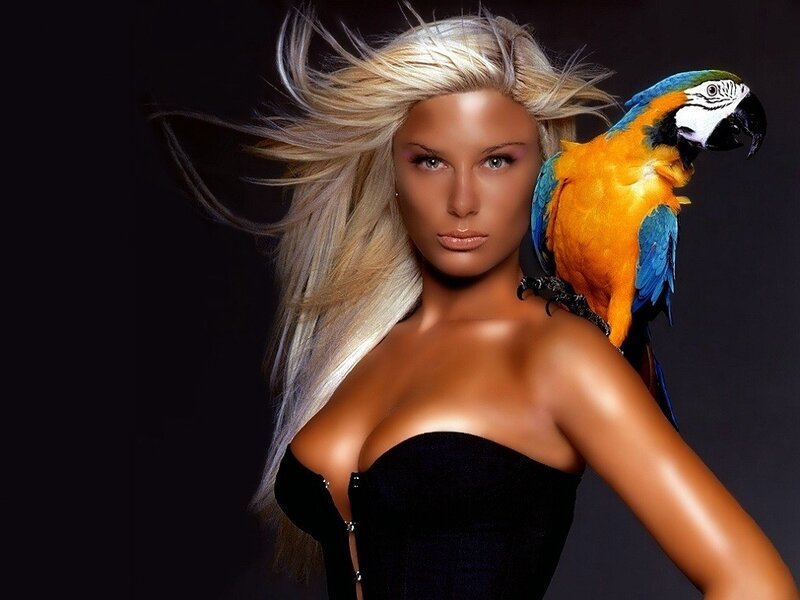 woman with parrot on shoulder