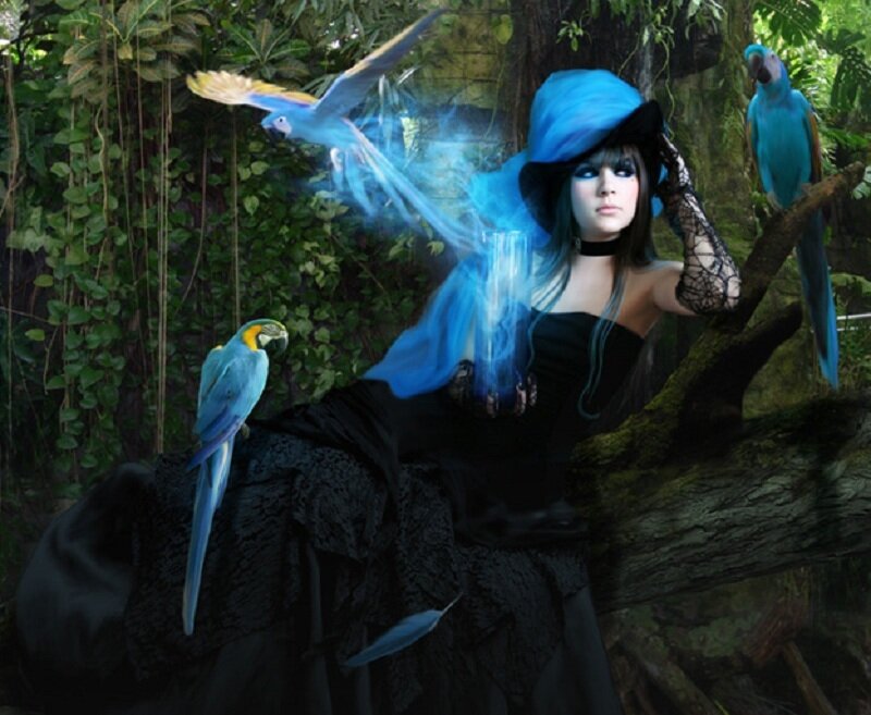 woman with parrots in jungle