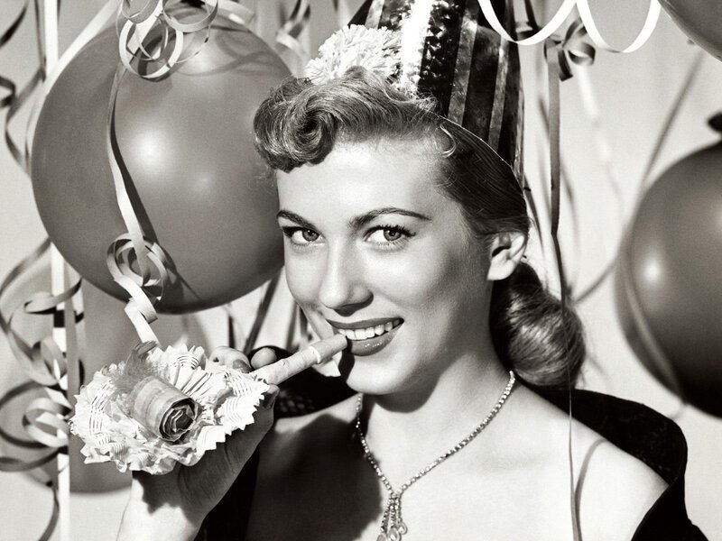 woman with party horn