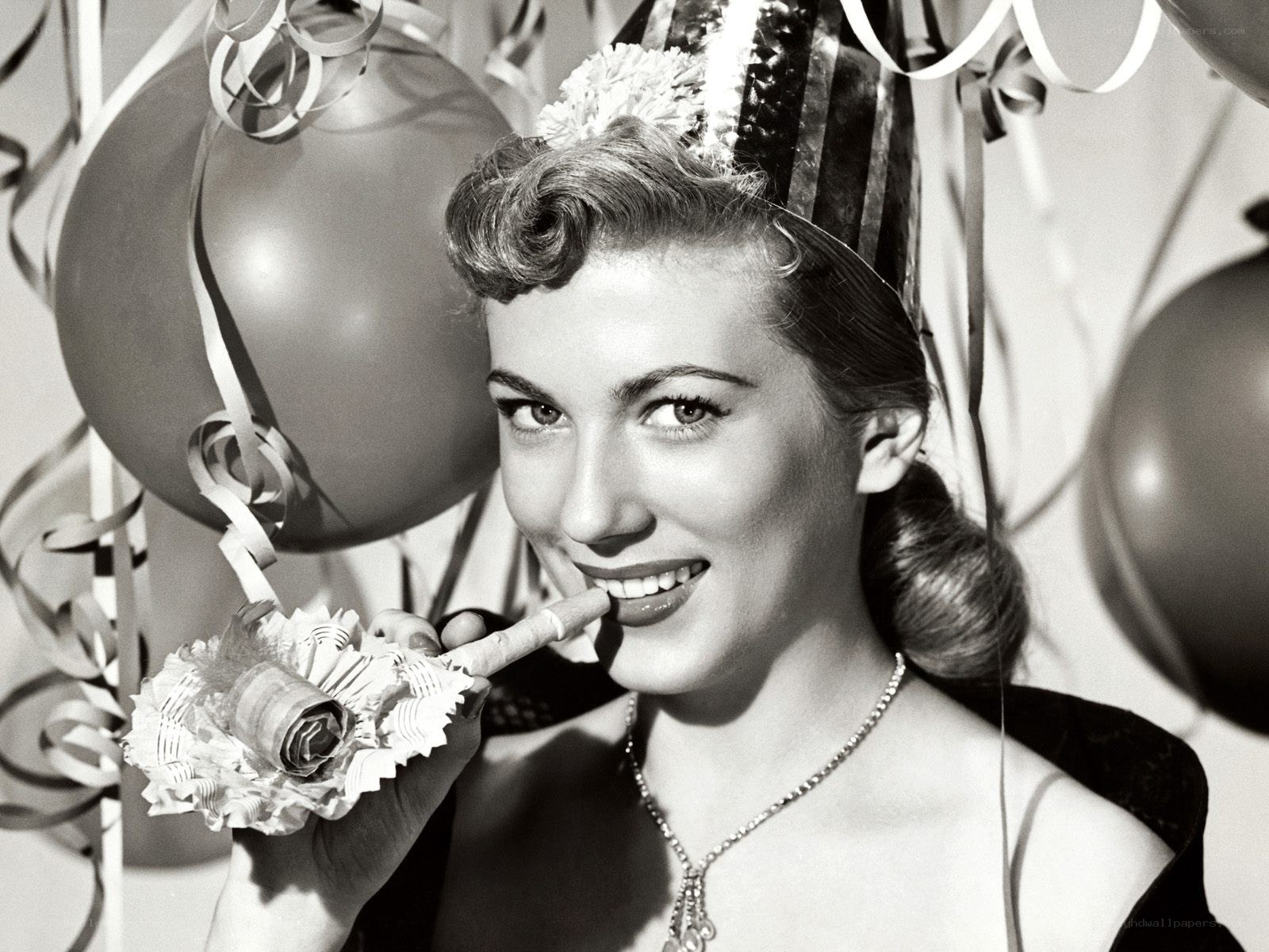 woman with party horn