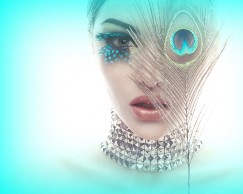 woman with peacock feather
