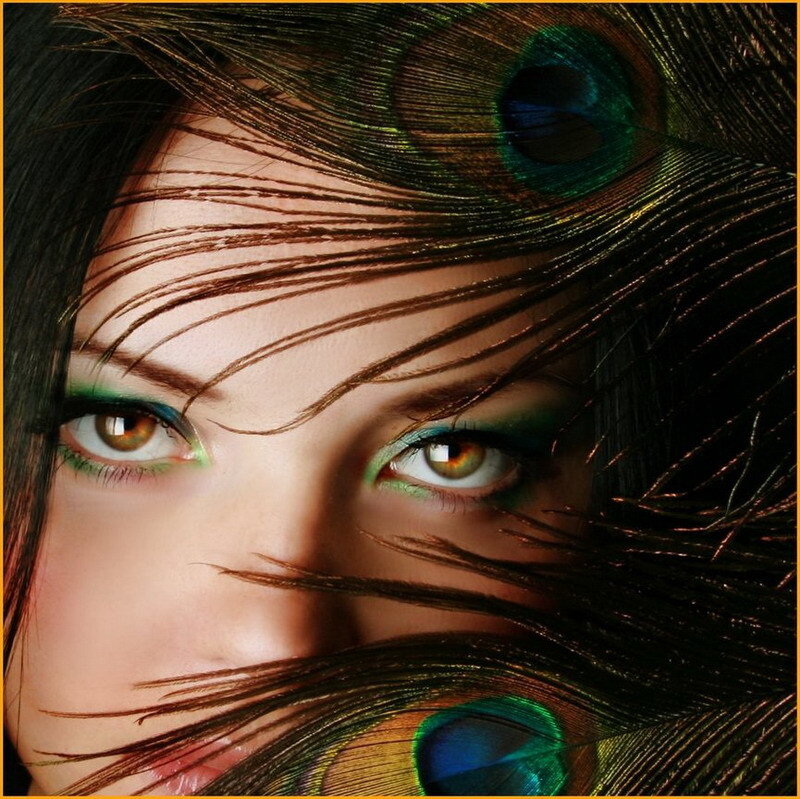 woman with peacock feathers