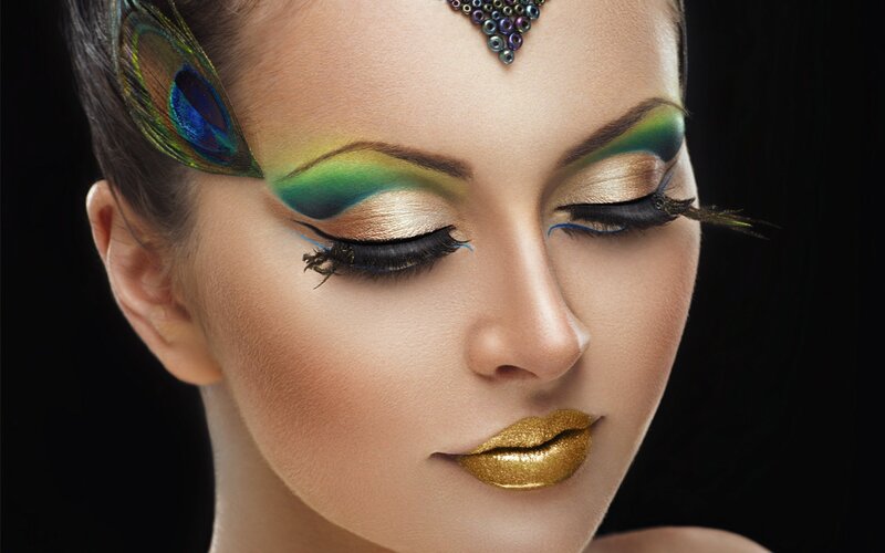 Woman with Peacock Makeup — Gold