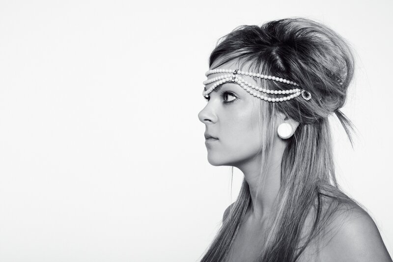 woman with pearl headband