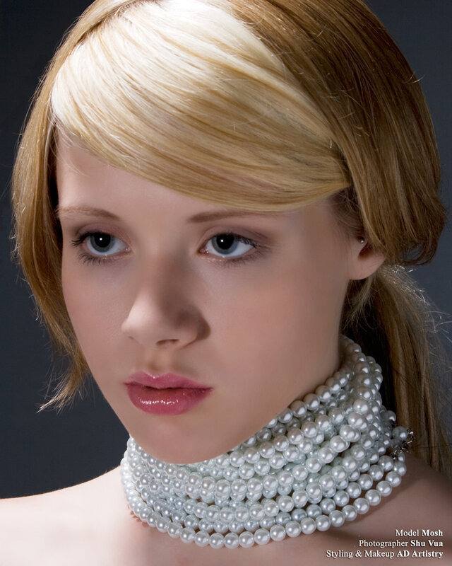 woman with pearl necklace