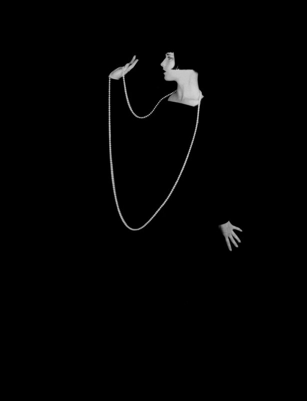 woman with pearl necklace