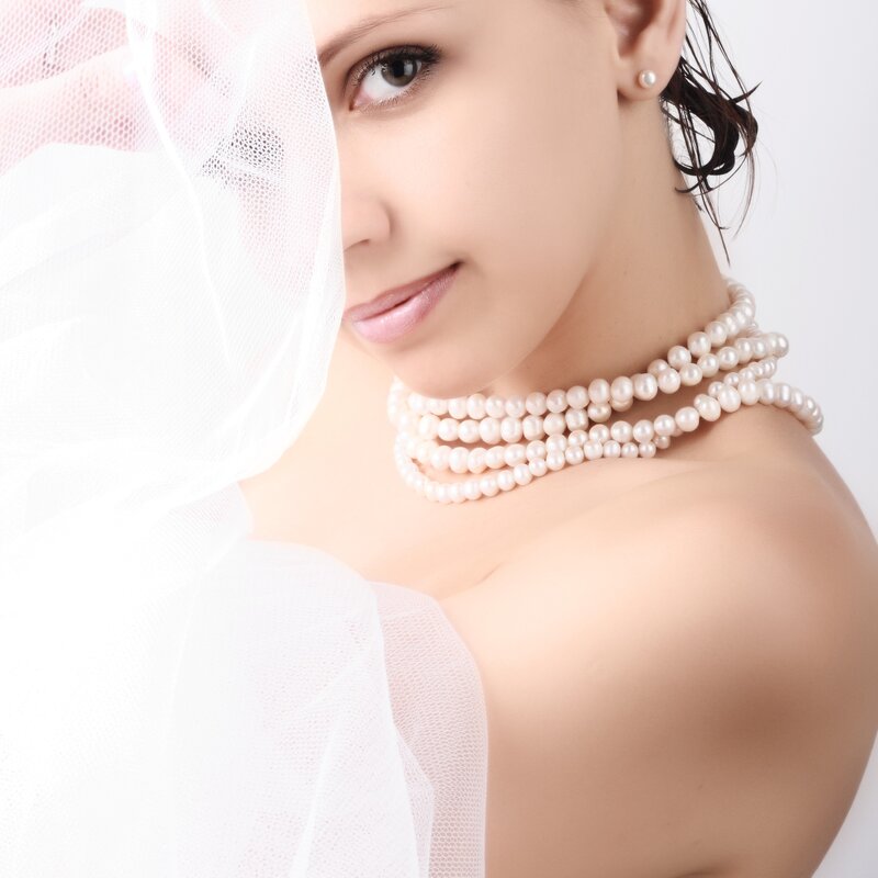 woman with pearl necklace
