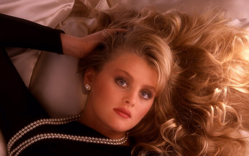 woman with pearls and blonde hair
