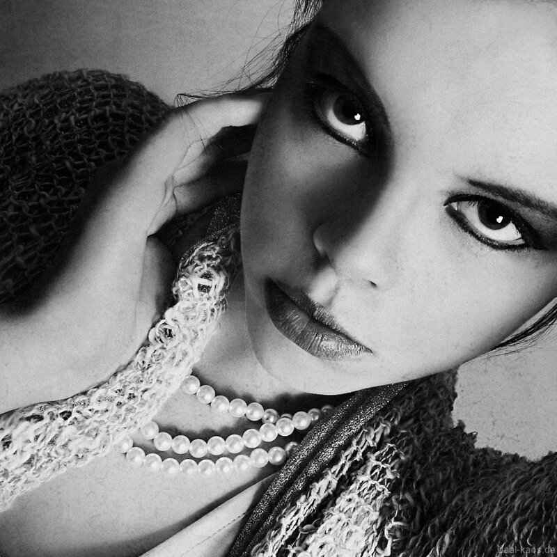 Woman with Pearls — Black, Dramatic, Photograph, Knitwear
