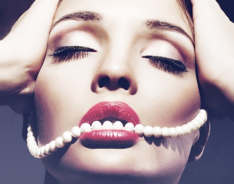 Woman with Pearls — White, Dramatic, Photograph, Makeup, Hands