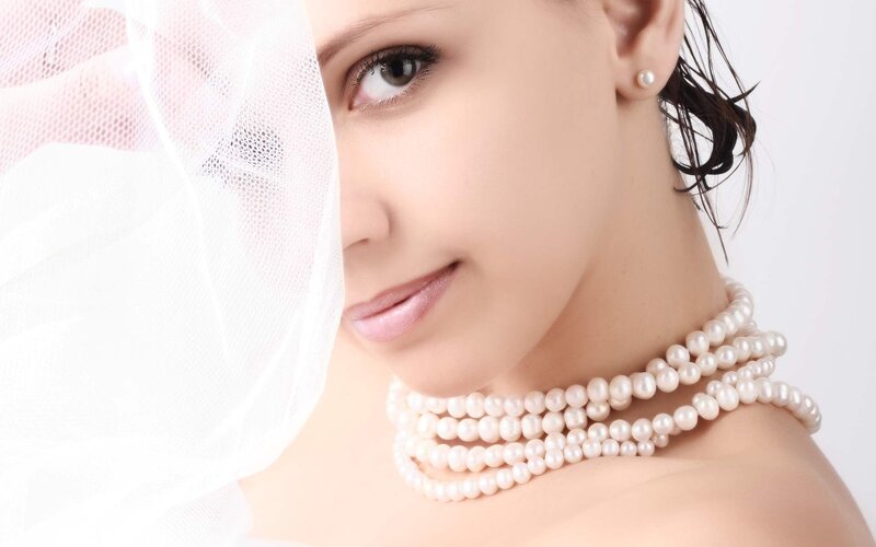 Woman with Pearls — White, Serene