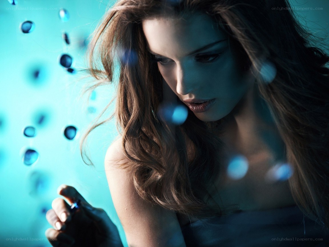 woman with perfume bottle