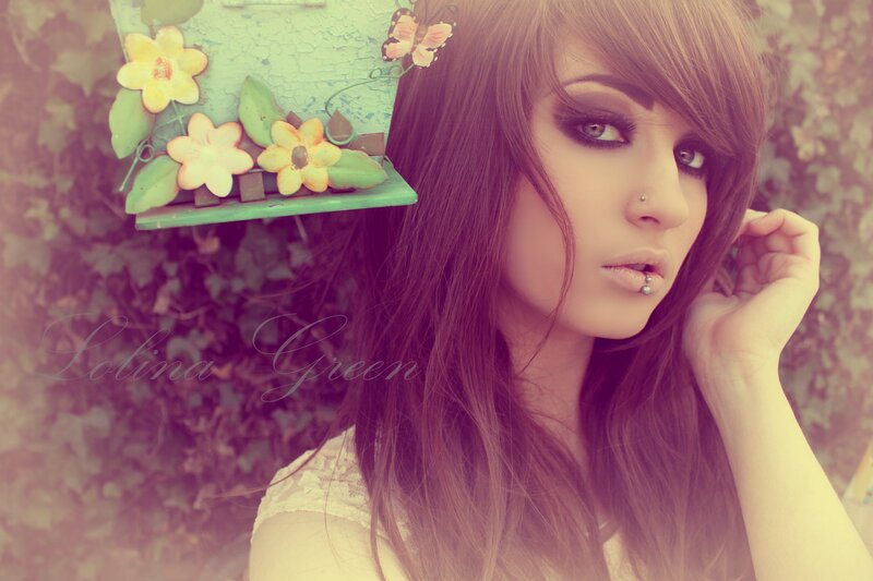 woman with piercings and makeup