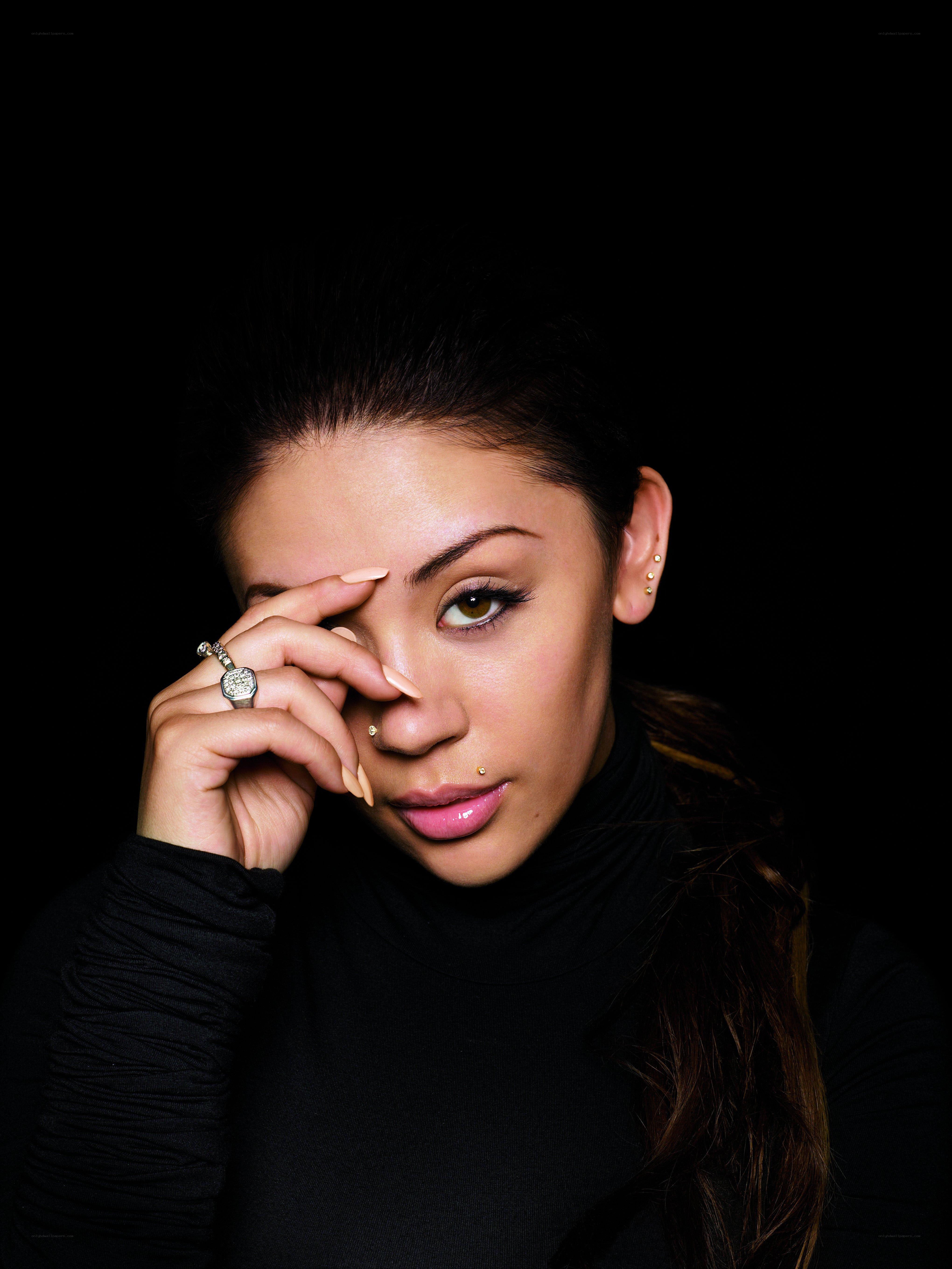 woman with piercings and ring